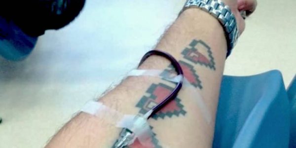 Giving Blood With A Tattoo