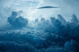 Lightning bolts in clouds.