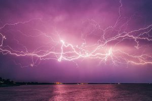 White flashes of Lightning in the Sky.