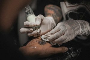 photo of tattoo, ink, hand, and sunflower
