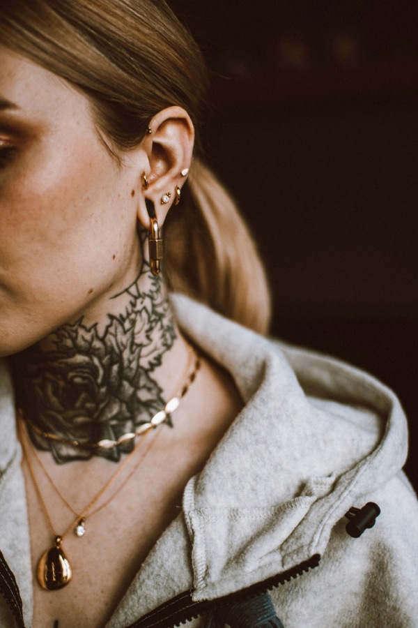 Neck tattoo on a woman